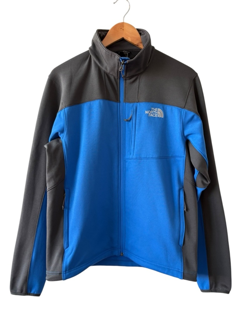 The North Face Men’s Blue and Black Softshell Jacket